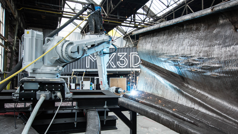 Illustration for article titled The First 3D-Printed Steel Bridge Looks Like It Broke Off an Alien Mothership